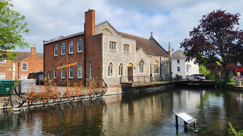 Photo we took of a building at Bridge st also including the Viking Memorial sculpture